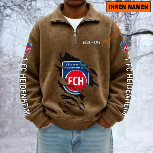 1. FC Heidenheim – Sweatshirt mit Halbzip – Neue Version mit Ihrem Namen 1. FC Heidenheim – Sweatshirt mit Halbzip – Neue Version mit Ihrem Namen